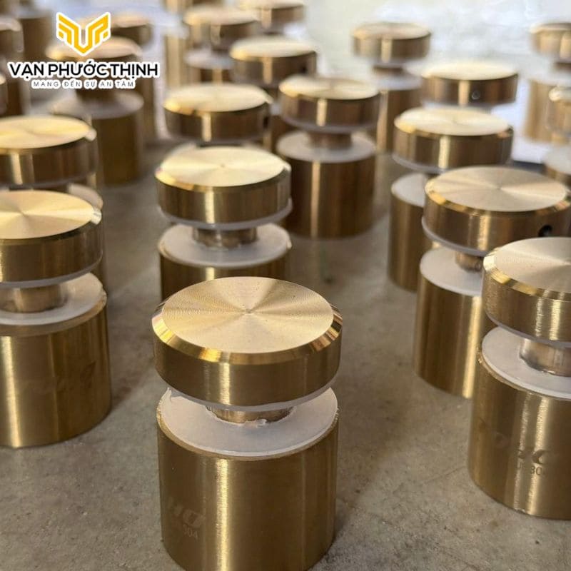 Ốc bắt kính cầu thang tròn đặc phi 38 inox 304 màu vàng